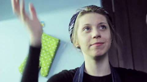 Woman talking and gesticulating in the kitchen Stock Footage 45588059