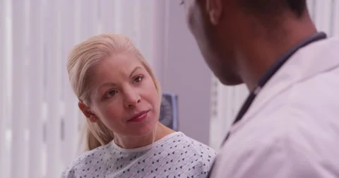 Woman talking to her doctor Stock-Footage 59677895