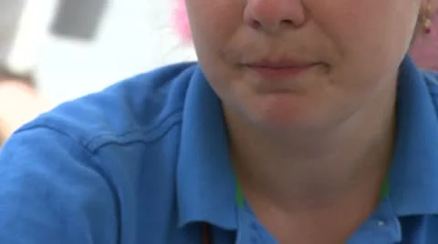 Woman talking while she is eating french fries Stock Footage