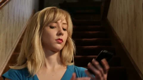 Woman talks on iPhone Stock Footage 11895066
