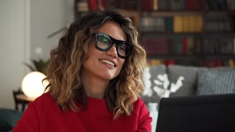 Woman talks laughs via webcam Stock Footage 92616319