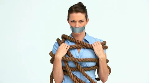 Woman with tape on the mouth and attached with a rope Stock Footage