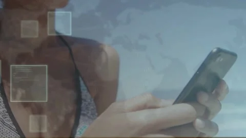 Woman tapping phone, activating UI and world map for travel app, camera pulling Stock Footage 333553051