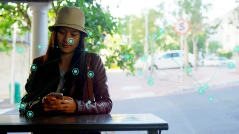 Woman tapping smartphone at kiosk, using tech, mapping nearby nodes with overlay Video stock 333950208