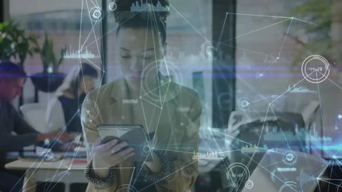 Woman tapping tablet and activating technology overlays for analyzing network Stock Footage 331062395