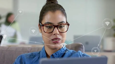 Woman tapping tablet and activating network nodes spreading across office, Stock Footage 334743838
