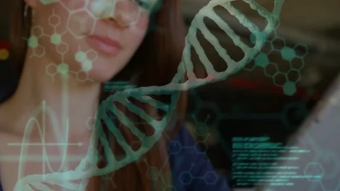 Woman tapping tablet, causing DNA helix, hexagon overlays, glowing code, Stock Footage 333657440