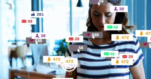 Woman tapping tablet, causing notification badges merging into 257 heart counter Stock Footage 321799940