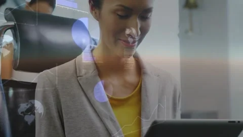 Woman tapping tablet, causing tech overlays revealing code charts while Stock Footage 333900217