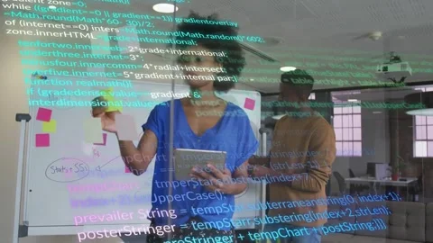 Woman tapping tablet, lifting postit, starting business planning with code Stock Footage 331270228