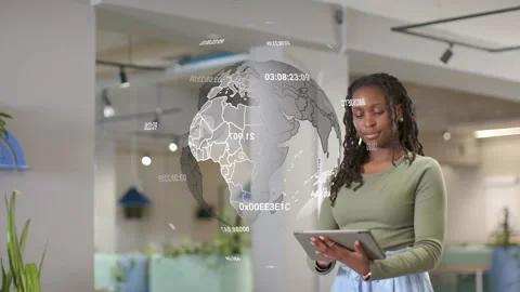 Woman tapping tablet in open office, syncing 3D globe rotation and numeric 動画素材 334113844