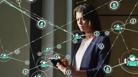 Woman tapping tablet powering technology network nodes growing into Stockbeeldmateriaal 309895396
