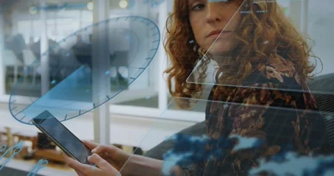 Woman tapping tablet right thumb swiping scanning bringing blue HUD overlays for Stock Footage 320651870