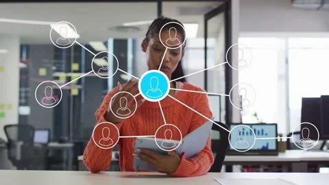 Woman tapping tablet, showing tech network to explain user links as nodes Stock Footage 333925442