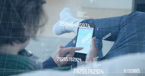 Woman tapping tablet on sofa visualizing data on animated analytics dashboard 動画素材 320088460