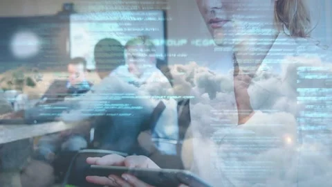 Woman tapping tablet team gesturing cloud code overlay fading, revealing Stock Footage 333610288