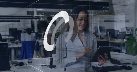 Woman tapping tablet in tech office, causing UI overlay animating, revealing Stock Footage 333965808