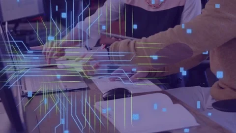 Woman tapping tablet while man typing keyboard, showing code and circuitry over Stock-Footage 335466170