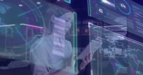 Woman tech pro holding tablet and tapping, updating HUD graphs and world map, Stock Footage 331026053
