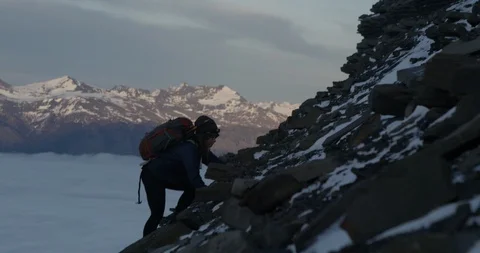 Woman technical climbing with view on mountains Stock Footage 90406635