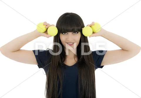 Woman tennis player holding a racket and balls, isolated on a white backgroun Stock Photos