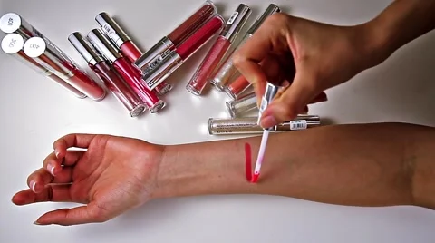 Woman tests cosmetics on a hand Stock Footage 56908321