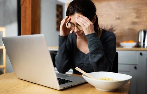 Woman Thinkin About Problem Working On Laptop Stock Photos