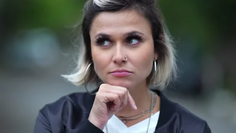 Woman thinking deeply about solution, person wondering remembering problem Stock Footage 165751760