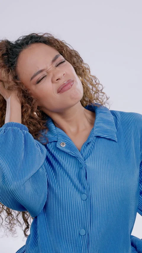 Woman, thinking or doubt in decision in studio with head scratch, shrug or Stock Footage 336710547