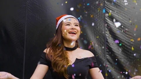 Woman throwing confetti 스톡 동영상 80556863