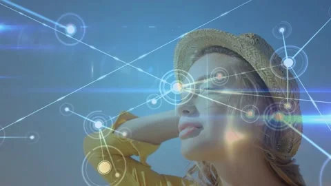 Woman tilting while tech node animation beginning, expanding over face and 動画素材 333414047