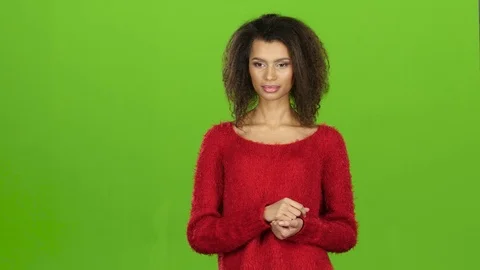 Woman is tired of working with virtual program, green screen Stock Footage 75612942
