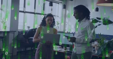 Woman toggling laptop starting code layer growing as man checking tablet, peer Stock Footage 334114423