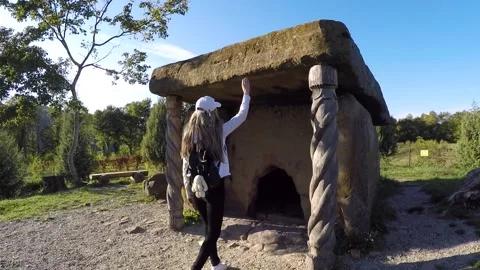 Woman touching dolmen Stock Footage 144217375