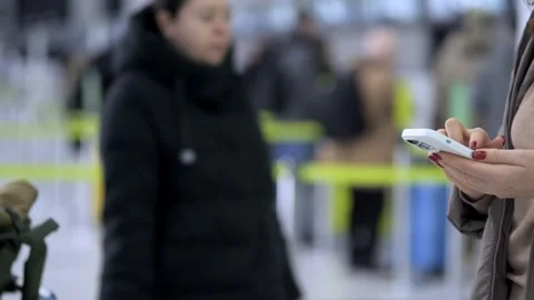Woman is touching a red button on a machine Stock Footage 304773446