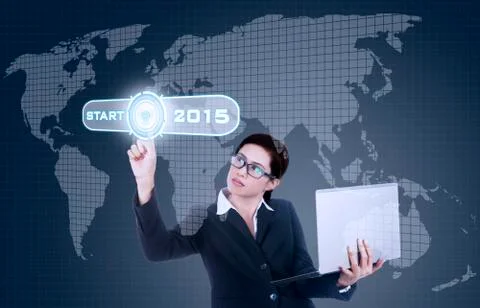 Woman touching a start button to future Stock Illustration