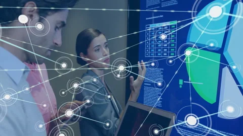 Woman touching touchscreen as man syncing data and generating network overlay on 動画素材 309688035