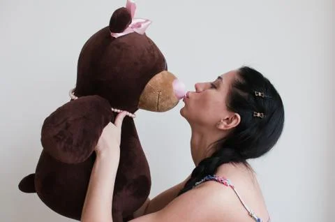 Woman with the toy bear Stock Photos