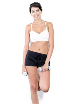 Woman training with weights 写真素材