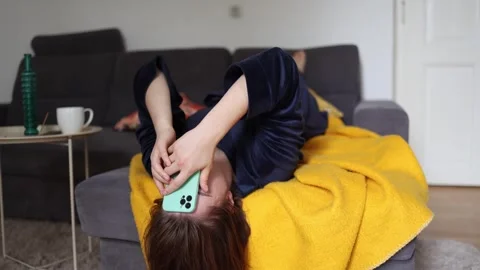 Woman trapped in endless doom scrolling Video stock 341233688
