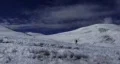 Woman trekking in snow 1 HD Footage