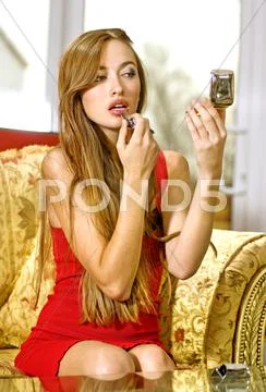 Woman trims oneself up Stock Photos
