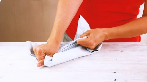 Woman trying to break poly envelope, package, Stock Footage 112282196