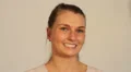 Woman turning and smiling at camera HD Footage