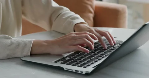 Woman type on laptop computer Video stock 131228404