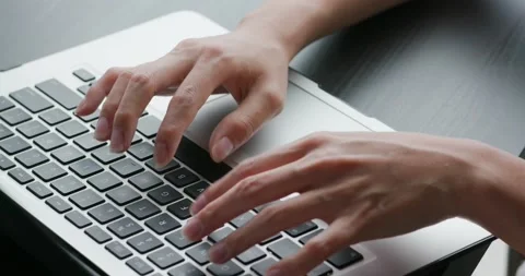 Woman type on laptop computer Stock Footage 131768650