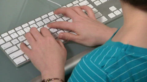 Woman types on computer Stock Footage 446125