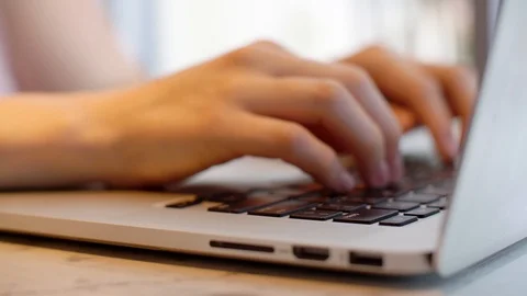 Woman Types on Computer Keyboard Stock Footage 102236806
