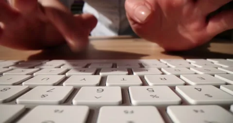 Woman types fast on computer keyboard working from home Stock Footage 267096771