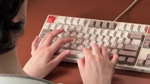 A woman types text on a keyboard. Stock-Footage 301291547